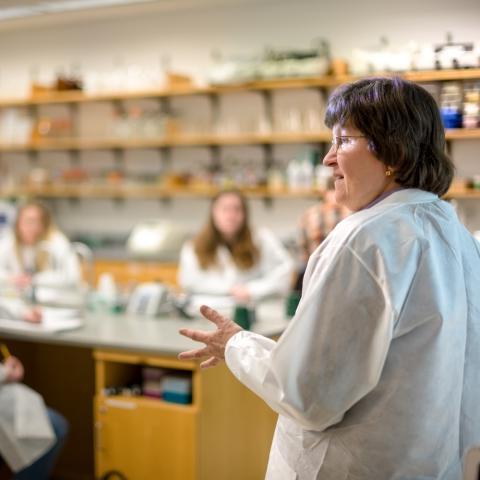 professor and students in lab